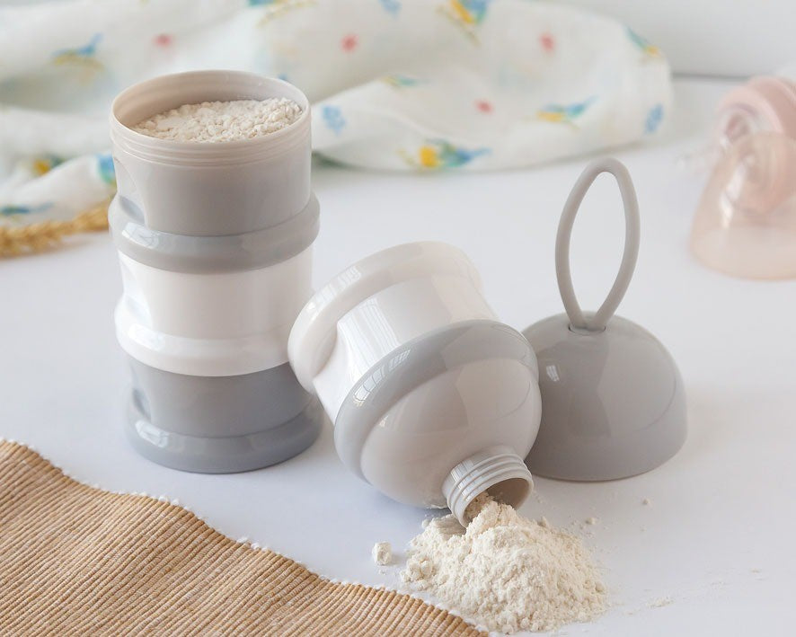 Dosificador de leche en polvo azul/rosa Kiokids