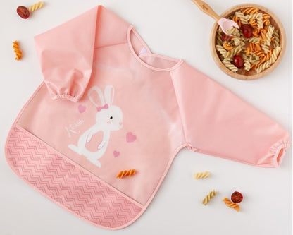 Babero impermeable con mangas Conejito/Dino de Kiokids