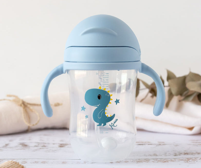 Taza de aprendizaje con asas Dino/Conejito  300 ml de Kiokids