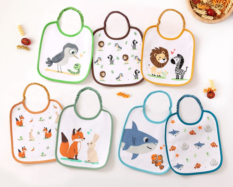 Set de Baberos Impermeables 7 unidades con "Motivos de Animales" de Kiokids