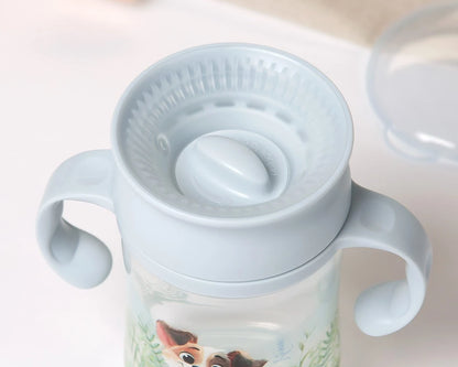 Taza de aprendizaje step 3 con asas azul 330ml de Kiokids