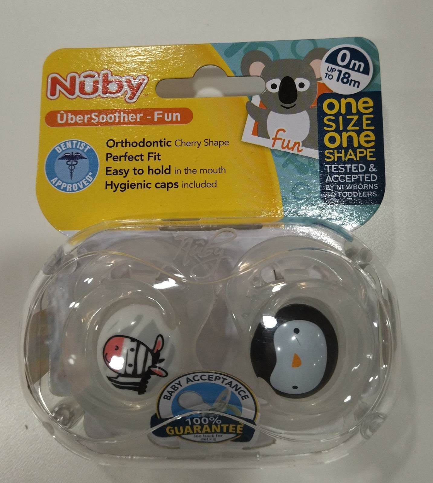 Pack De Dos Chupetes De Animalitos Cebra y Pingüino De 0/18M De Nuby